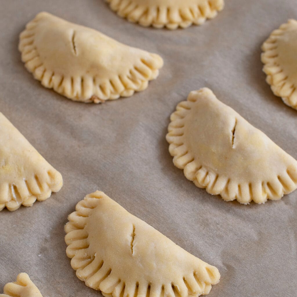 Emapanaditas de Queso y Dulce Raspado